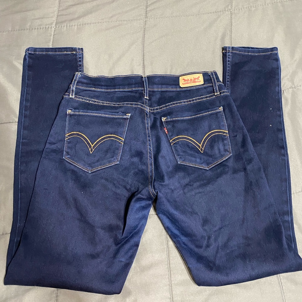 Levis 524 skinny low rise